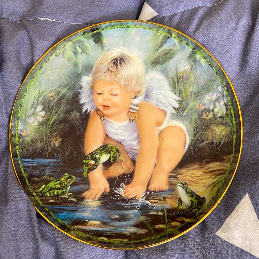 An adorable Bradford Exchange collection plate.